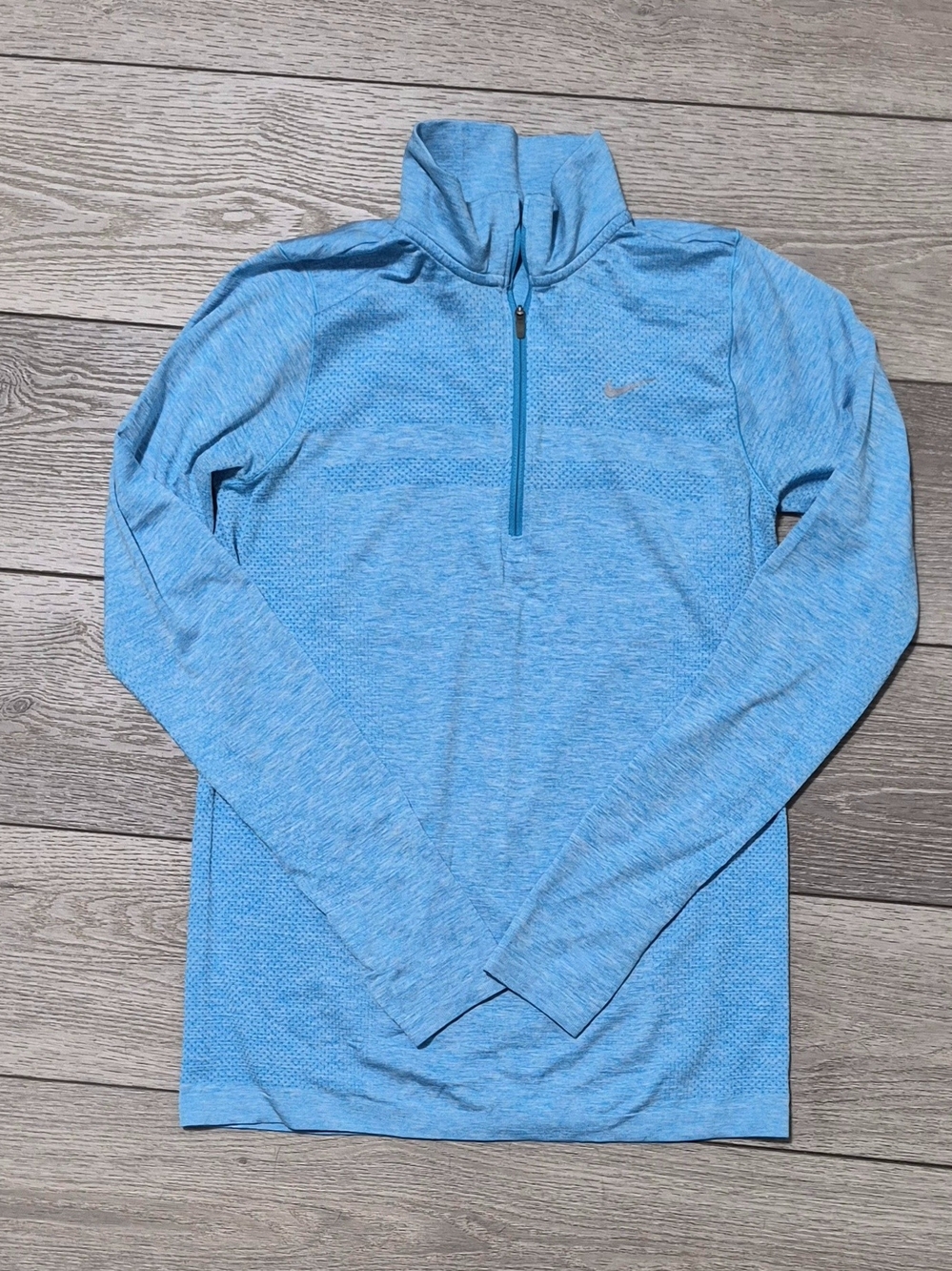 Nike Dri-FIT women’s long sleeve 1/4 zip running top in size medium